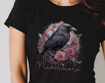 May include: Black t-shirt with a graphic of a raven perched on a branch with pink roses and the text "Nevermore".