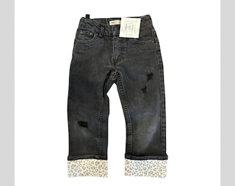 Levi's Distressed Black Jeans with Soft Animal Print Details - Cool Grunge Style