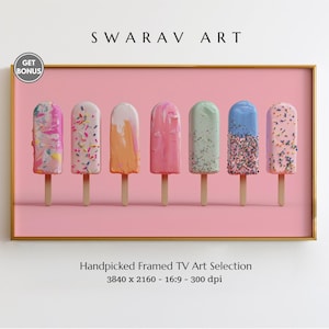 May include: A framed art print displaying seven ice lolly illustrations on a pink backdrop. Each lolly has a unique design with sprinkles and various colours. The artwork is titled "SWARAV ART".