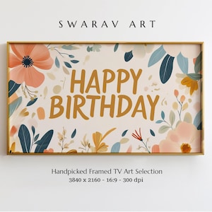 May include: A framed print with a floral design and the text "HAPPY BIRTHDAY" in gold lettering. The background is a light cream color with a variety of flowers and leaves in shades of pink, blue, yellow, and green.