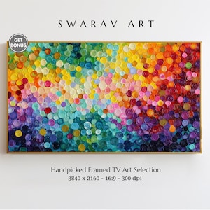 May include: A framed abstract artwork with a vibrant array of colours, including yellow, orange, red, purple, and blue. The painting features a textured surface with a pattern of small, circular shapes. The text "SWARAV ART" is at the top.