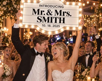 May include: A rectangular marquee sign with rounded corners and illuminated bulbs around the perimeter. The white sign features black text that reads INTRODUCING Mr. & Mrs. SMITH and the date 10. 18. 2025 in a bold, serif font.