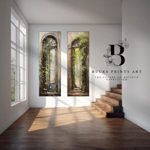 Può includere: Due opere d'arte murale verticali raffigurano porte ad arco aperte ricoperte di vegetazione. L'opera d'arte è esposta in una stanza luminosa con pavimento e scale in legno. Il testo "BUCKS PRINTS ART" e "THE FUTURE OF ARTISTIC EXPRESSION" è visibile.