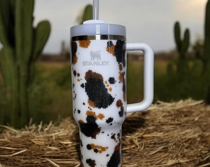 Featured listing image: Cowhide Glitter 40oz Stanley