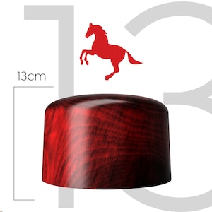 May include: A red wooden hat with a dark wood grain pattern. The hat is 13 cm tall.