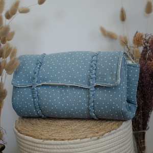 Cambiador de viaje acolchado impermeable con almohadilla extraíble