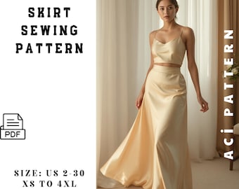 May include: A satin long skirt sewing pattern. The image shows a woman wearing a matching satin crop top and long skirt in a light beige color. The text on the left says "SATIN LONG SKIRT SEWING PATTERN" and "SIZE: US 2-30 XS TO 4XL A4/ A0 FORMAT".