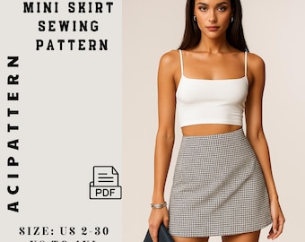 Op de afbeelding: A-lijn minirok naaipatroon. De afbeelding toont een vrouw die een witte crop top en een zwart-wit geruite minirok draagt. De tekst op de afbeelding luidt "A-LINE MINI SKIRT SEWING PATTERN" en "ACIPATTERN". Het patroon is verkrijgbaar in US maten 2-30 en XS tot 4XL.