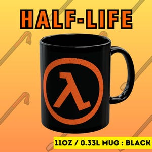 May include: Black ceramic mug with a large orange Lambda symbol in a circle. The mug reads "HALF-LIFE" and "11oz / 0.33L MUG : BLACK".