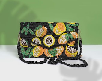 Rebecca Hand-Embroidered Beaded Clutch – White Beads with Green Leaf Design – Elegant Handmade Evening Bag
