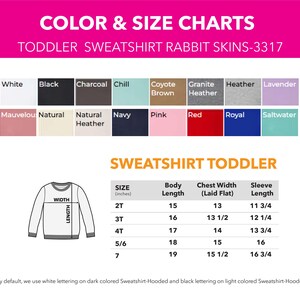 May include: A color and size chart for toddler sweatshirts. The chart includes a color palette with options like white, black, and navy. Measurements are provided in inches for body length, chest width, and sleeve length for sizes 2T to 7.