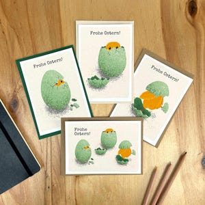 Ab 7,80 Euro: Osterkartenset mit Küken | Set aus 4 Postkarten mit Osterküken | Frohe Ostern - Karte für Ostergrüße auf Deutsch oder Englisch