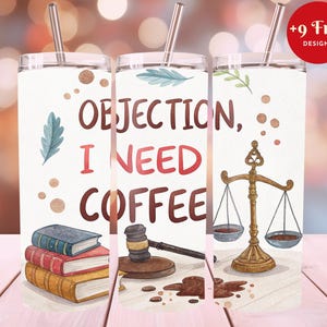 May include: A white tumbler with a stainless steel straw features the text "OBJECTION, I NEED COFFEE" in brown and red. The design includes illustrations of books, a gavel, and scales of justice. The tumbler also has a red circle with the text "+9 Free Designs".