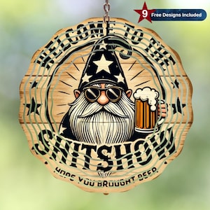 May include: Wooden sign with a gnome wearing sunglasses and a star-covered hat, holding a beer mug. The sign reads "WELCOME TO THE SHITSHOW, HOPE YOU BROUGHT BEER." Includes a red star with the text "9 Free Designs Included."