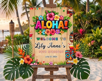 May include: A wooden sign with the word "Aloha" in bright colours, decorated with tropical flowers and leaves. It welcomes guests to Lily Anne's 50th birthday on July 12, 202x. The sign is displayed on a wooden easel.