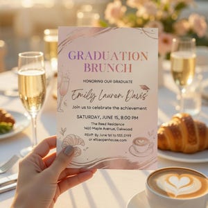 May include: A graduation brunch invitation with a soft pink and gold design. The invitation includes the text "GRADUATION BRUNCH" and details for the event, including the graduate's name, date, time, and location. A hand holds the invitation.