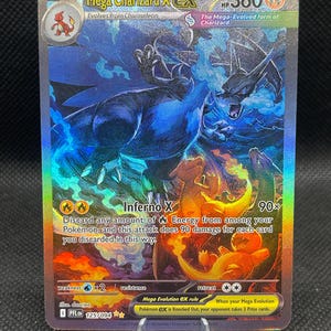 May include: A holographic Mega Charizard X ex trading card with 360 HP. The card features a large blue dragon-like creature, a smaller orange dragon, and a Charmander. Text includes Mega Charizard X ex, Inferno X, and game rules.