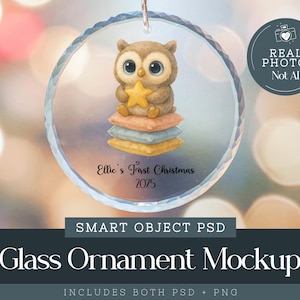 May include: A clear glass ornament featuring a cartoon owl holding a gold star, perched on colorful pillows. The ornament has the text "Ellie's First Christmas 2025". The image also includes the text "REAL PHOTO Not AI" and "Glass Ornament Mockup".