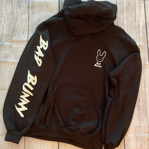 Glow in the dark Bad Bunny Hoodie | Bad Bunny Sweatshirt | Bad Bunny Merch | Bad Bunny Black Hoodie | Bad Bunny Shirt | Bad Bunny Logo