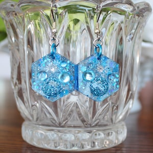 Pendientes colgantes con brillo azul