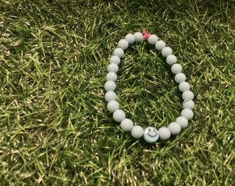 blue smiley face  bracelet