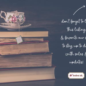 May include: A stack of vintage books with aged pages supports a floral teacup and saucer. A tea bag hangs from the cup. The image includes the text: "don't forget to like this listing & favorite our shop to stay up to date with sales & updates!"