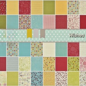May include: A collection of patterned paper squares in various colors and designs, including red, yellow, green, and blue. The word "Wishes" is displayed on a light blue banner with white polka dots, and yellow, gray, and tan banners.