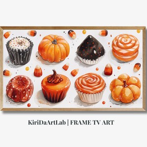 Pode incluir: Uma pintura em aquarela emoldurada de guloseimas com tema de Halloween. A pintura apresenta cupcakes, abóboras e milho doce em tons de laranja, preto e branco.