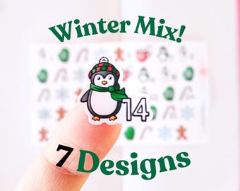 Pegatinas para agenda con diseño invernal: números para calendario con cuenta atrás, mini pegatinas de muñeco de nieve, pequeñas fechas semanales para bullet journal con temática de chocolate.