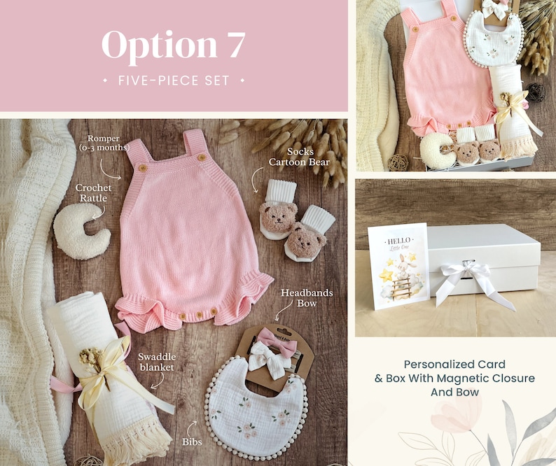 May include: A five-piece baby gift set in a pink and white color scheme. The set includes a pink knitted romper, a white swaddle blanket, a crochet rattle, a pair of socks with a cartoon bear design, and a bib with a floral pattern. The set is packaged in a white gift box with a magnetic closure and a bow. The box also includes a personalized card with the text "HELLO Little One".