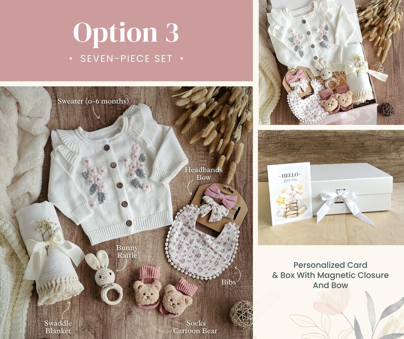 May include: A seven-piece baby gift set in a white box with a magnetic closure and a white bow. The set includes a white sweater with floral embroidery, a white swaddle blanket, a white bib with floral print, a pair of pink socks with a cartoon bear, a white headband with a pink bow, a bunny rattle, and a personalized card that says "Hello Little One".