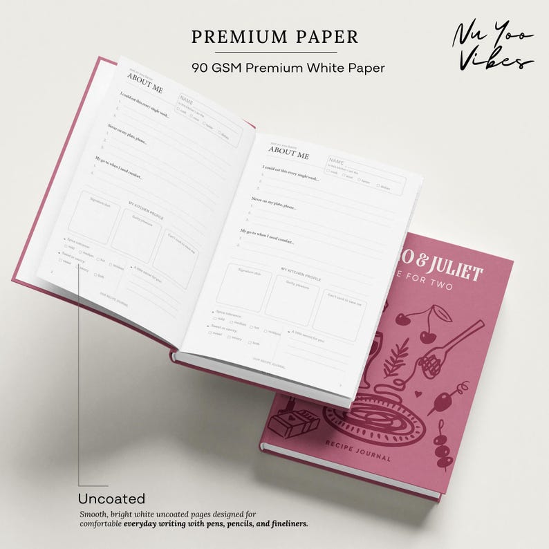 May include: A recipe journal titled Romeo & Juliet Recipe for Two with a dusty rose cover featuring white line art of food items. The open journal displays white pages with printed sections labeled About Me and My Kitchen Profile on 90 GSM paper.