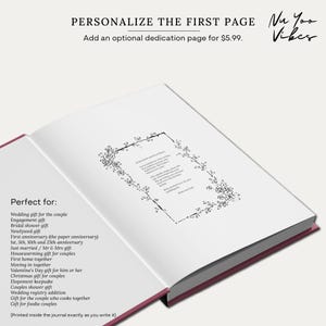 May include: An open journal with a white page featuring a black floral border and a printed dedication. The text reads: PERSONALIZE THE FIRST PAGE, Nu Yoo Vibes, and a list of gift occasions. The journal has a dark pink cover visible at the edges.