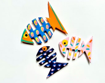 Colección EL ESCUADRÓN. ¡Lleva los coloridos y extravagantes imanes Friends Fish a tu cocina u oficina! ¡Diversión, colores llamativos y fijación fuerte!