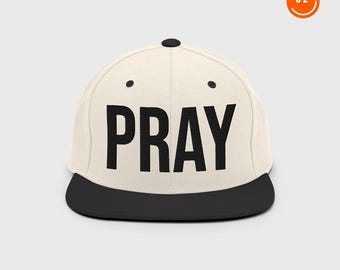Casquette snapback noir sur crème Pray