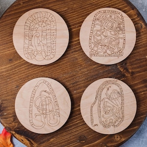 Wooden runestone coaster set with 4 different designs from the Viking age, set#2