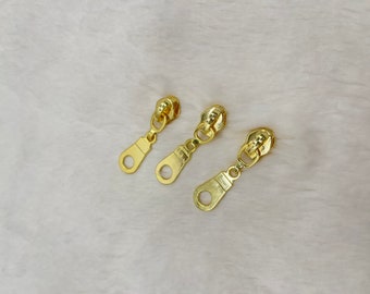Curseur pour fermeture 30mm en métal doré