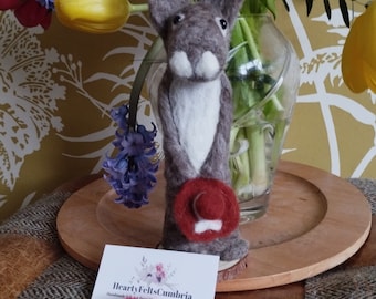 Handmade Adorable Rabbit, showing off her hats, made in various colours.