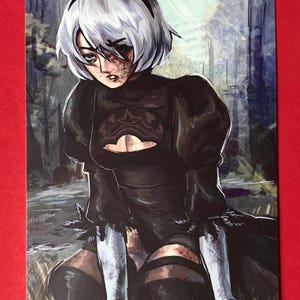 May include: An illustration of a character with short white hair, a black headband, and a black outfit. The character has a damaged face and is set against a blurred forest background. The artwork is on a red background.