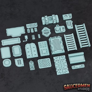 May include: A set of 22 blue plastic sci-fi themed building pieces for miniature gaming. The pieces include doors, windows, panels, stairs, and other details.