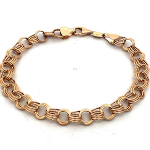 Prachtige 14k geelgouden driedubbele cirkel schakel karabijnsluiting 7,25" armband