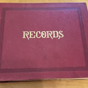 1960&#39;s Red Leather RECORDS Book Containing Ten 45 Mixed Artists Vinyl Lot