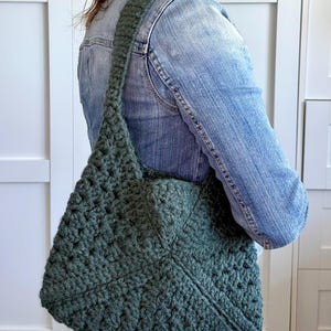 Granny square bag pattern with a woman holding the finished bag, made of granny squares.