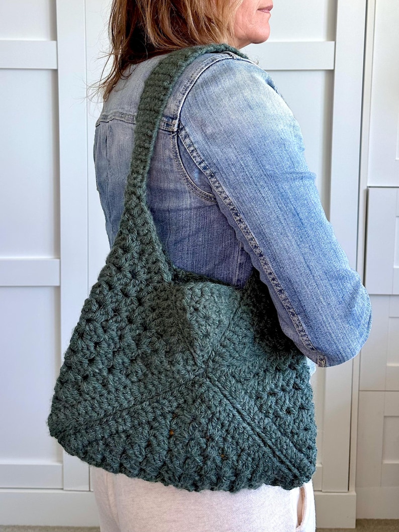 Granny square bag pattern with a woman holding the finished bag, made of granny squares.