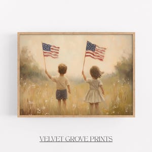 May include: A framed print featuring a painting of two children holding American flags in a field of tall grass. The children are viewed from the back, with the American flag waving in the wind. The print is in a wooden frame.
