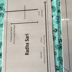 May include: A diagram showing how to measure and pleat a Radha Sari. The diagram includes instructions for measuring from the waist to the feet, the start and end of the pleats, and the front and back of the Radha Sari. The diagram also includes a note about the wrong side of the fabric.