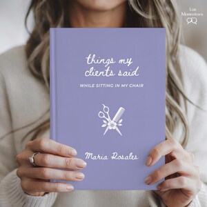 May include: A lavender journal titled "things my clients said while sitting in my chair" with a white scissors and comb graphic. The author's name, Maria Rosales, is printed at the bottom.