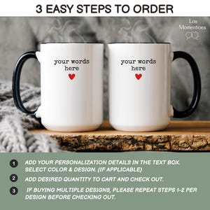 May include: Two white ceramic mugs with black handles and rims are displayed. Each mug has the text "your words here" with a red heart. The image also includes the text "3 EASY STEPS TO ORDER" and instructions for ordering.