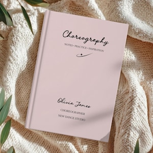 May include: A white ceramic mug with a black handle and the text "But First, Coffee" in a handwritten style. The mug is on a white surface. The mug is approximately 4 inches tall.