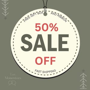 May include: A round cream-colored tag with a black string, displaying a 50% SALE OFF promotion. The text "FREE GIFT BOX AND RIBBON" and "FAST SHIPPING" are also present. The background is a muted green.